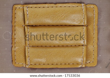 Leather pocket in the bag. Close-up. Genuine leather.