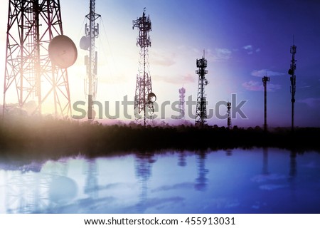 Telecommunication mast TV antennas wireless technology with sunligh sky
