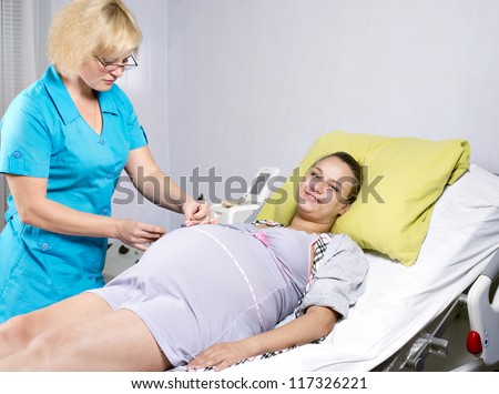 A survey of pregnant women, the measurement of the height of the bottom uterus, measuring a pregnant belly
