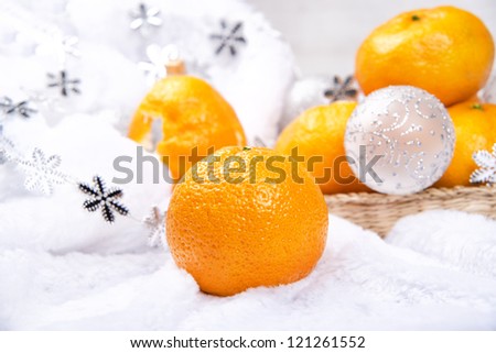 sweet fresh tangerine on the kitchen table,Christmas decorations for the Christmas tree ,tangerine from Georgia, Greece, Cyprus, India, Asia