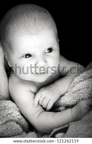 newborn infant in the arms of mom, black and white photos, monochrome