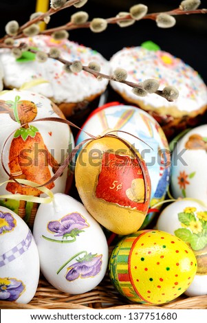 Easter cakes and painted eggs. Easter eggs with decoupage style. Decorative Eggs