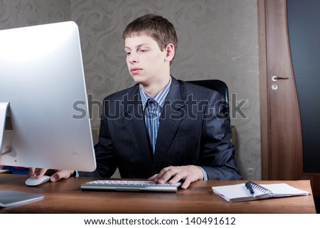 Office worker working at a computer.