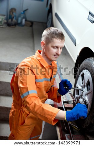 Car repair. Tire. Inspection of the vehicle suspension