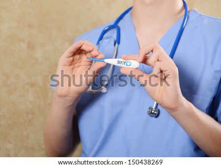 doctor measures the temperature of a sick patient. measurement of body temperature electronic thermometer, treatment of fever pills, medical records
