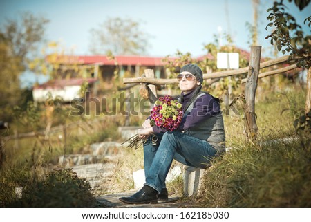 man with flowers