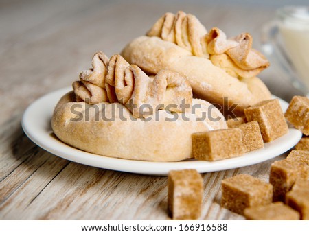 shortbread cookies on a saucer, with cane sugar