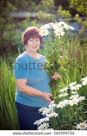 woman grows flowers
