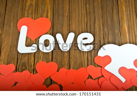 festive card with the word love and heart