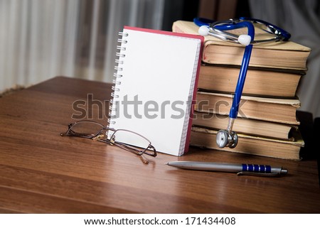 phonendoscope. medical records, books