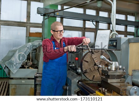 Turning work. A man working on the machine