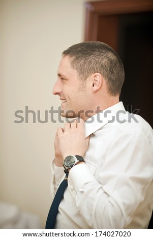 Of a handsome young man wears a shirt and tie. Portrait of young man