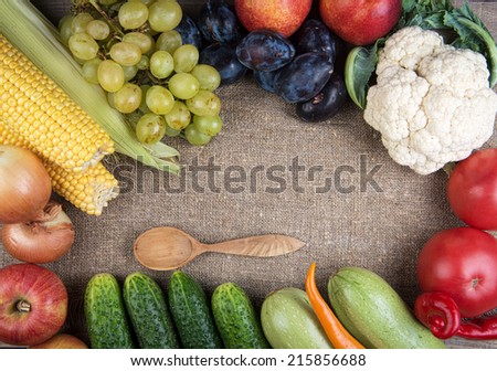 vegetables and fruits on wooden table. Healthy Organic Vegetables on a Wooden Background. Frame Design