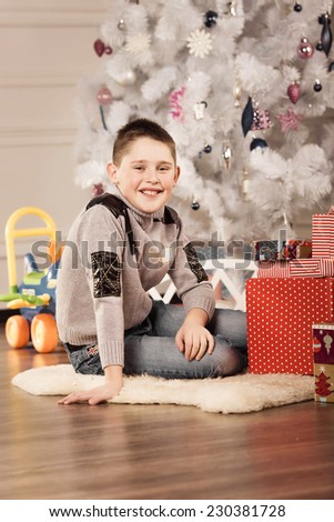 Boy with New Year presents