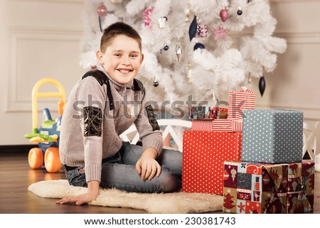 Boy with New Year presents