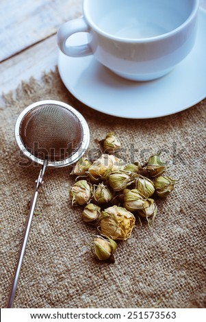 Flower tea rose buds with with tea infuser
