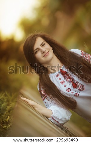 Portrait of the girl in the Ukrainian national clothes embroidery