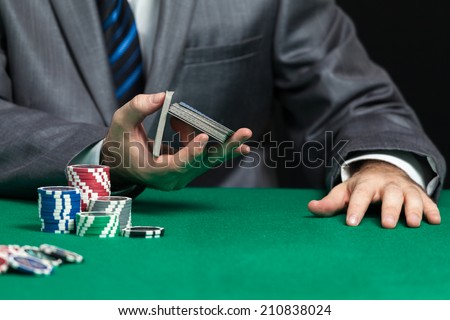 Blackjack In A Casino, Casino Worker Shuffling Cards