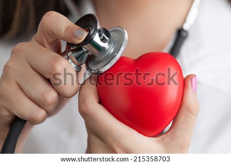 Doctor listening to the heartbeat