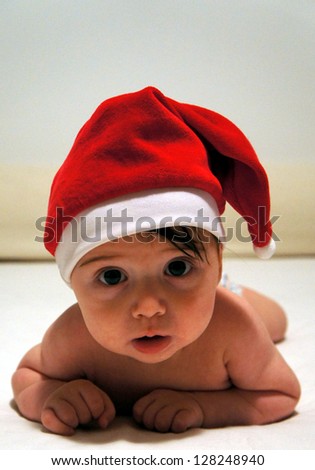 baby with a red hat