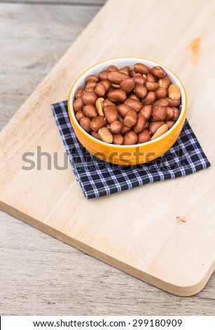 salt roasted peanuts  on wood table