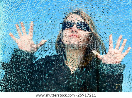 looking through smash glass woman