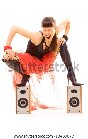 sexy woman mad with music. isolated on white