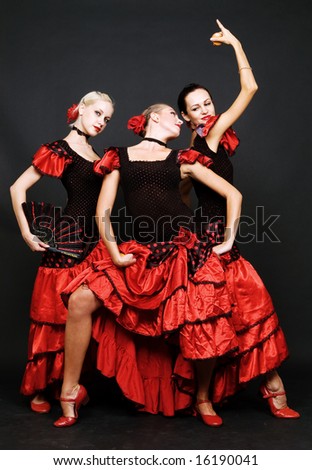 spanish dancers over dark background