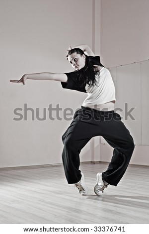 pretty hip-hop girl in dance. photo in dance studio