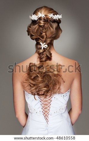 back view of beautiful haircut with small flowers