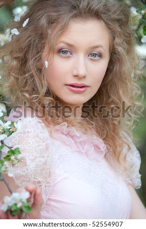 portrait of beautiful young model in pink dress