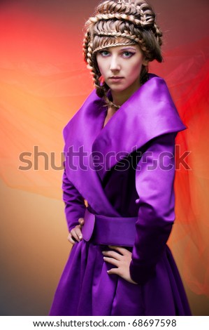 portrait of graceful woman in violet dress