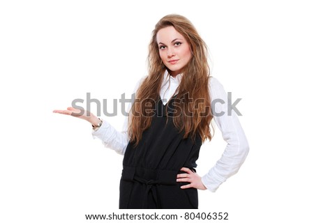 smiley businesswoman holding something on her palm over white background