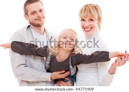 portrait of young smiley family. isolated on white background