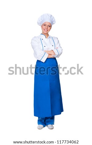 full length shot of smiley chef in blue apron. isolated on white background
