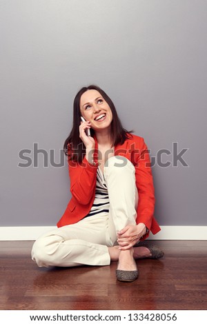 excited girl talking on the phone and laughing