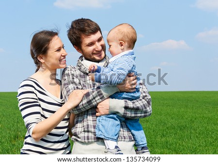 happy and smiley family at outdoors