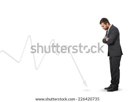 displeased man looking at downturn graph. isolated on white background