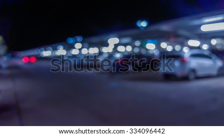 Motion blur car and defocus car park with bokeh