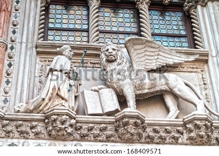 Griffin Statue at the Worlds most beautiful square Piazza San Marco. Picture of the amazing historical square of San Marco in the lagoon city of stone Venice in Italy