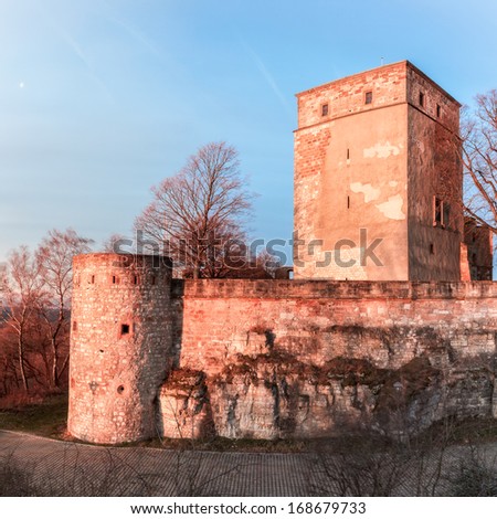 Medieval Fairy Tale Castle Giechburg in the Franconian Swiss of Bavaria, Germany. Picture was taken in late December in the morning hours. Sunlit from the morning sun