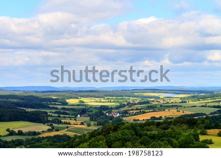 Summer Landscape in Upper Franconia, Germany, shot on a warm sunny day in June. Cloudy Sky in the rural countryside