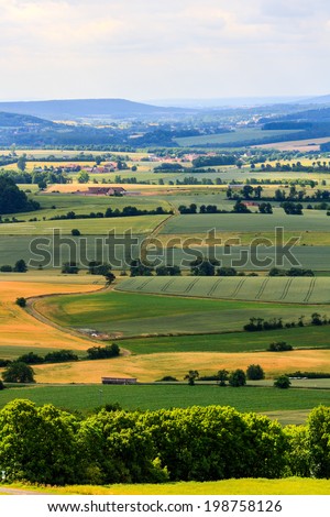 Summer Landscape in Upper Franconia, Germany, shot on a warm sunny day in June. Cloudy Sky in the rural countryside