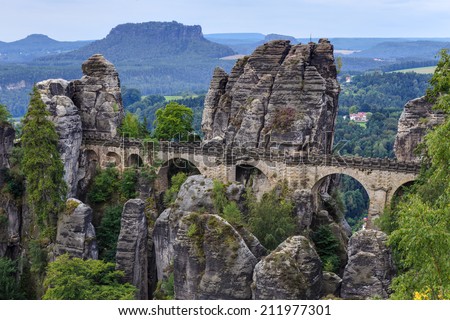 Bastion Bridge in the Saxonian Swiss in Germany, shot on a summer morning after sunrise. Landmark of Saxonia. Sandstone Rock Formations. Bridge leading to a former medieval castle near Dresden