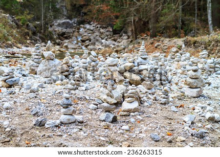 ZEN Meditation. Stones shaped to a pyramid in a valley near Neuschwanstein in autumn October, taken in Bavaria, Germany