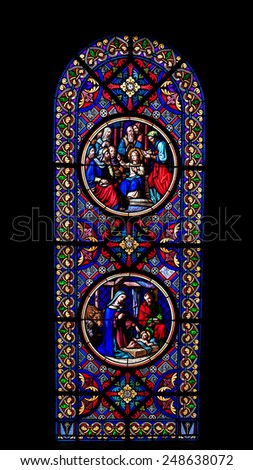 BASEL, SWITZERLAND - JANUARY 24 2015: Colorful Window in the Cathedral of Basel in Switzerland