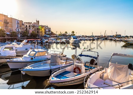 PALERMO, ITALY - JUNE 27 2014: Palermo Boat Harbor on a warm summer evening in Sicily, Italy. Lovely Mediterranean Atmosphere