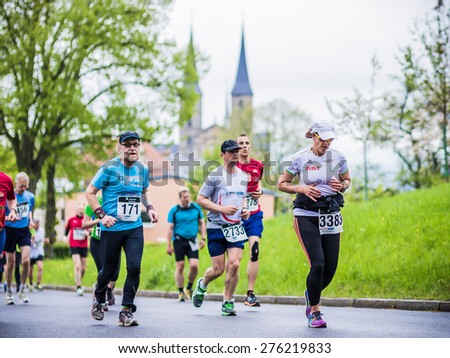 BAMBERG, GERMANY - MAY 03 2015: Weltkulturerbelauf, traditional long distance race event on a rainy day in the world culture heritage City of Bamberg in Franconia, Germany in May 2015