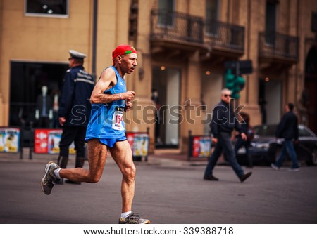 PALERMO, ITALY - NOVEMBER 15 2015: Pictures from the Half Marathon in Palermo, Sicily Italy in the old town. Big sports event. Fitness and Stamina through Running