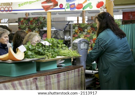 Buying in process. Food market